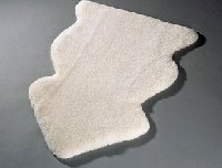 Детский коврик из овчиной шерсти Christ Mimosa 65см.
